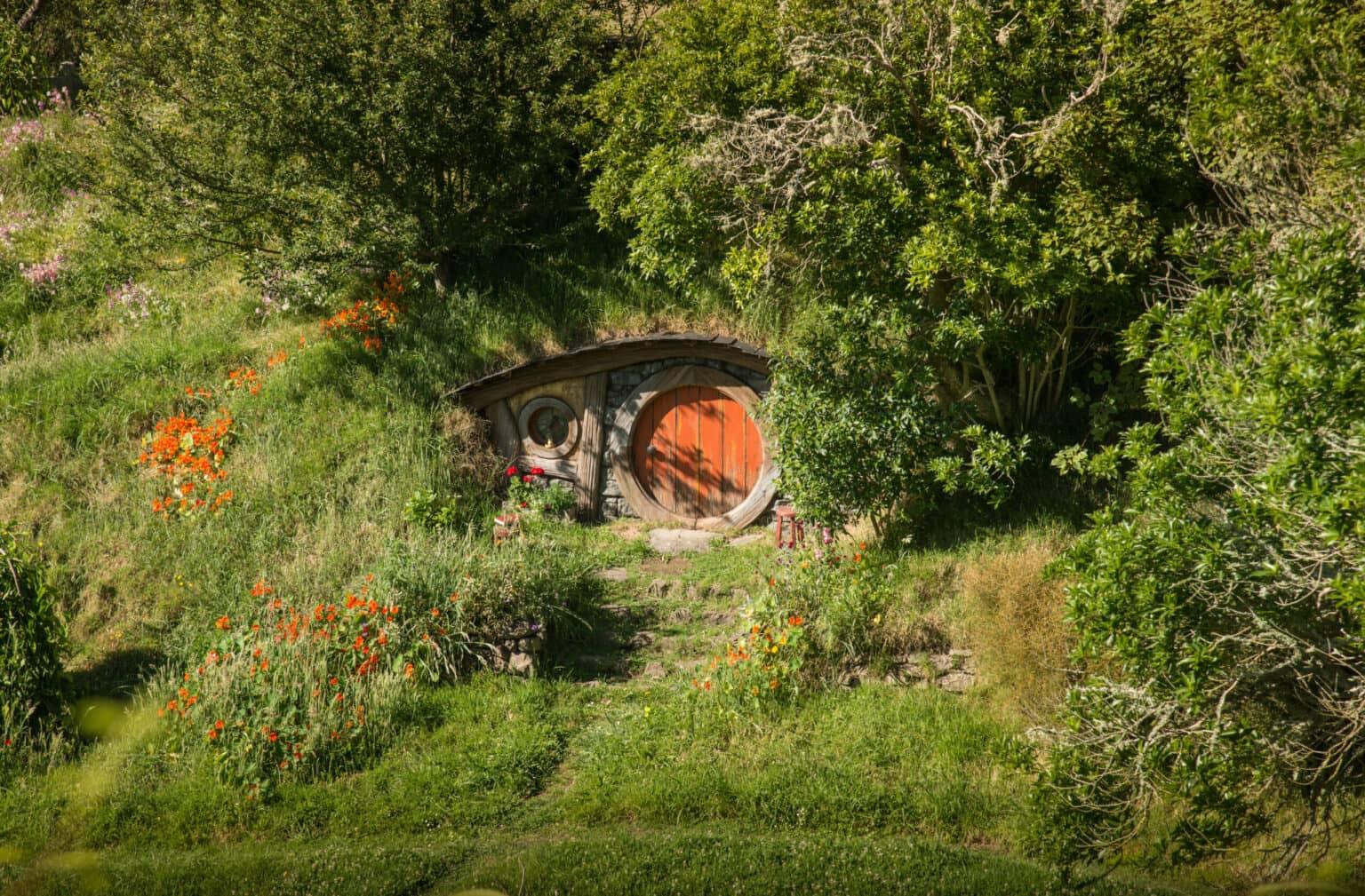 A small accommodation at Hobbit Motel New Zealand amidst greenery.