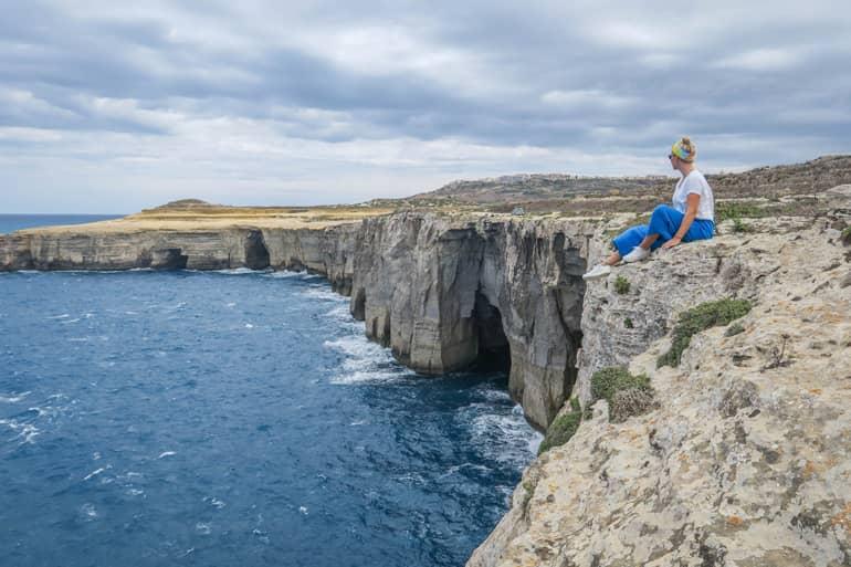 Woman gazes at the spectacular panorama around Wied Il-Mielah