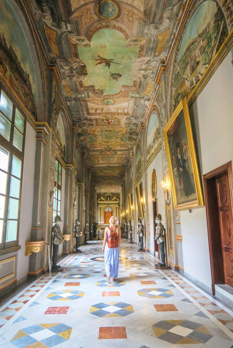 Hall in the Grandmaster's Palace in Valletta (Malta) with ceiling painting and wall murals