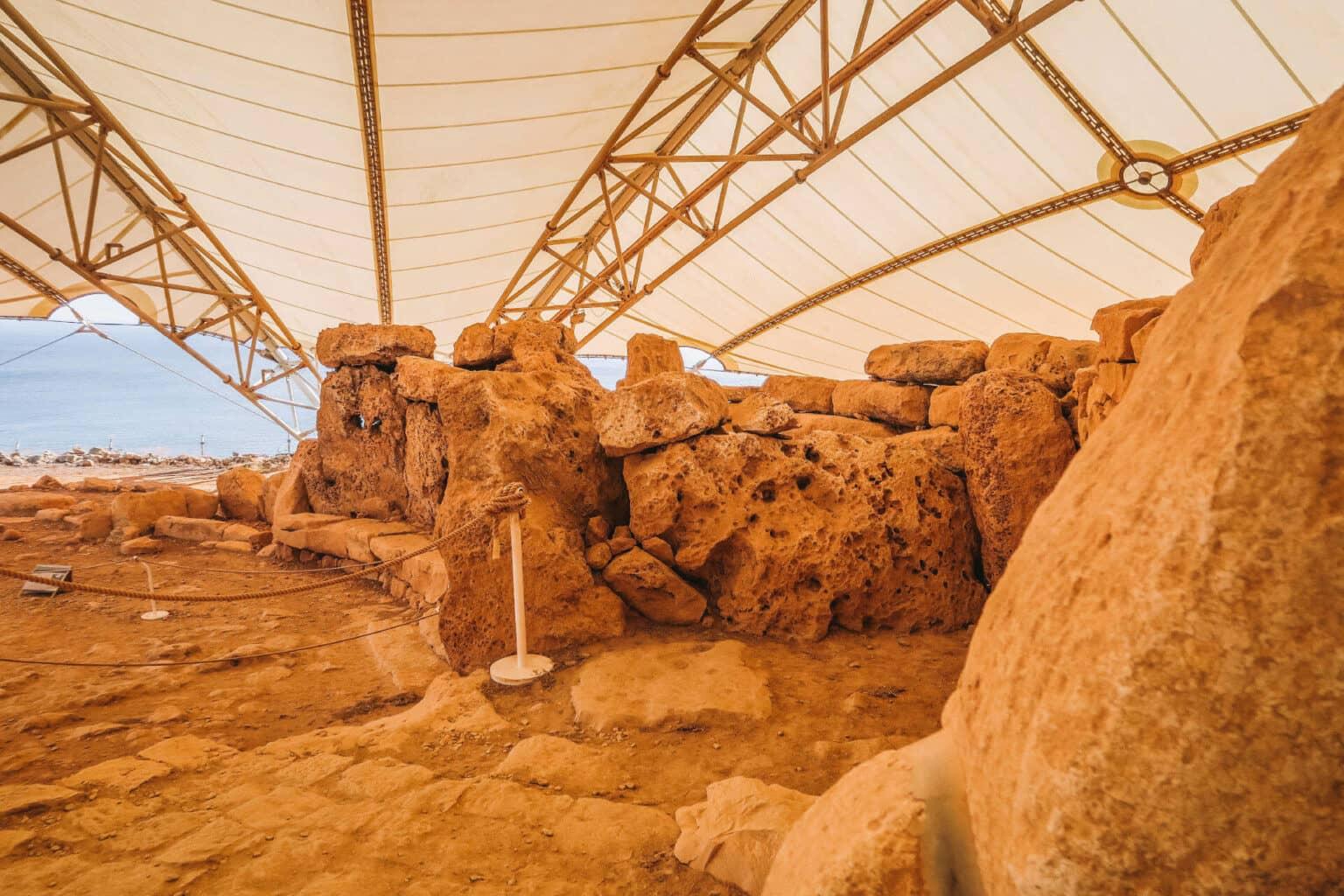 Remains of a temple under a tent.