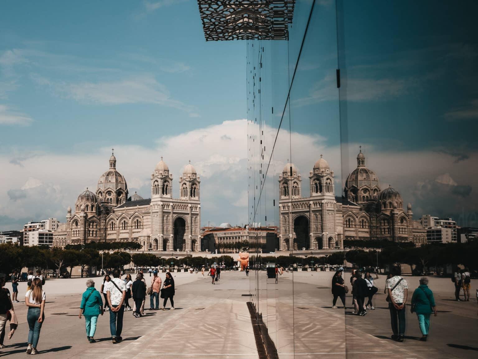 View from Mucem to the Cathedral of Marseille, reflecting on the walls of Mucem.