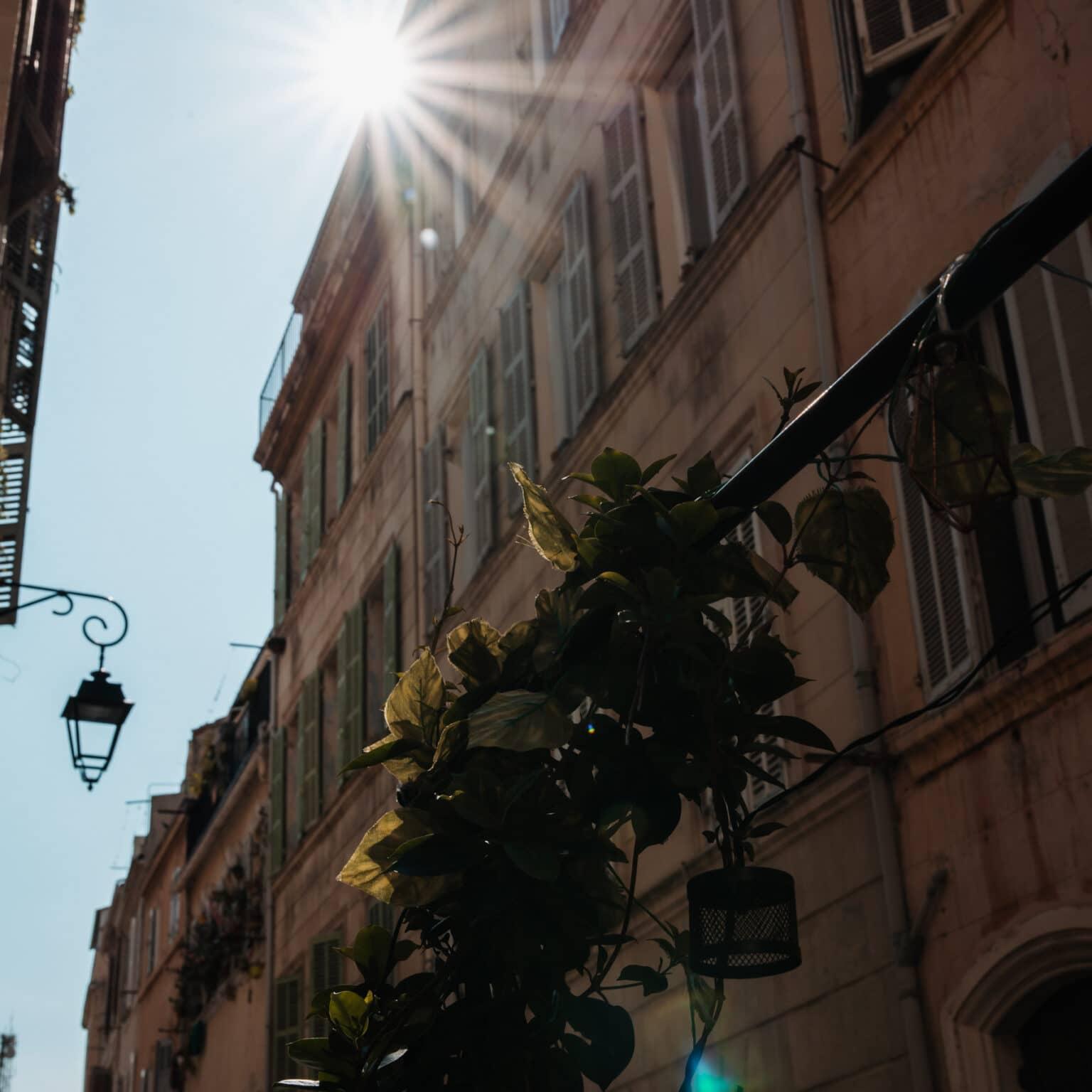 View of the old house facades and the sky in the Le Panier neighborhood in Marseille.