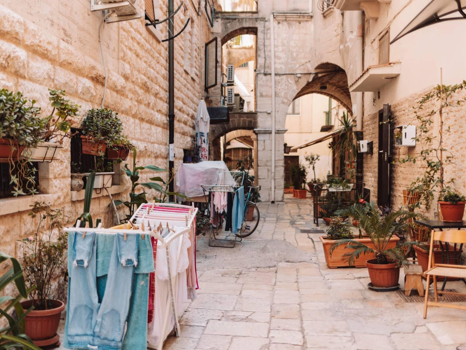 A backyard in the old town of Bari where laundry is drying.