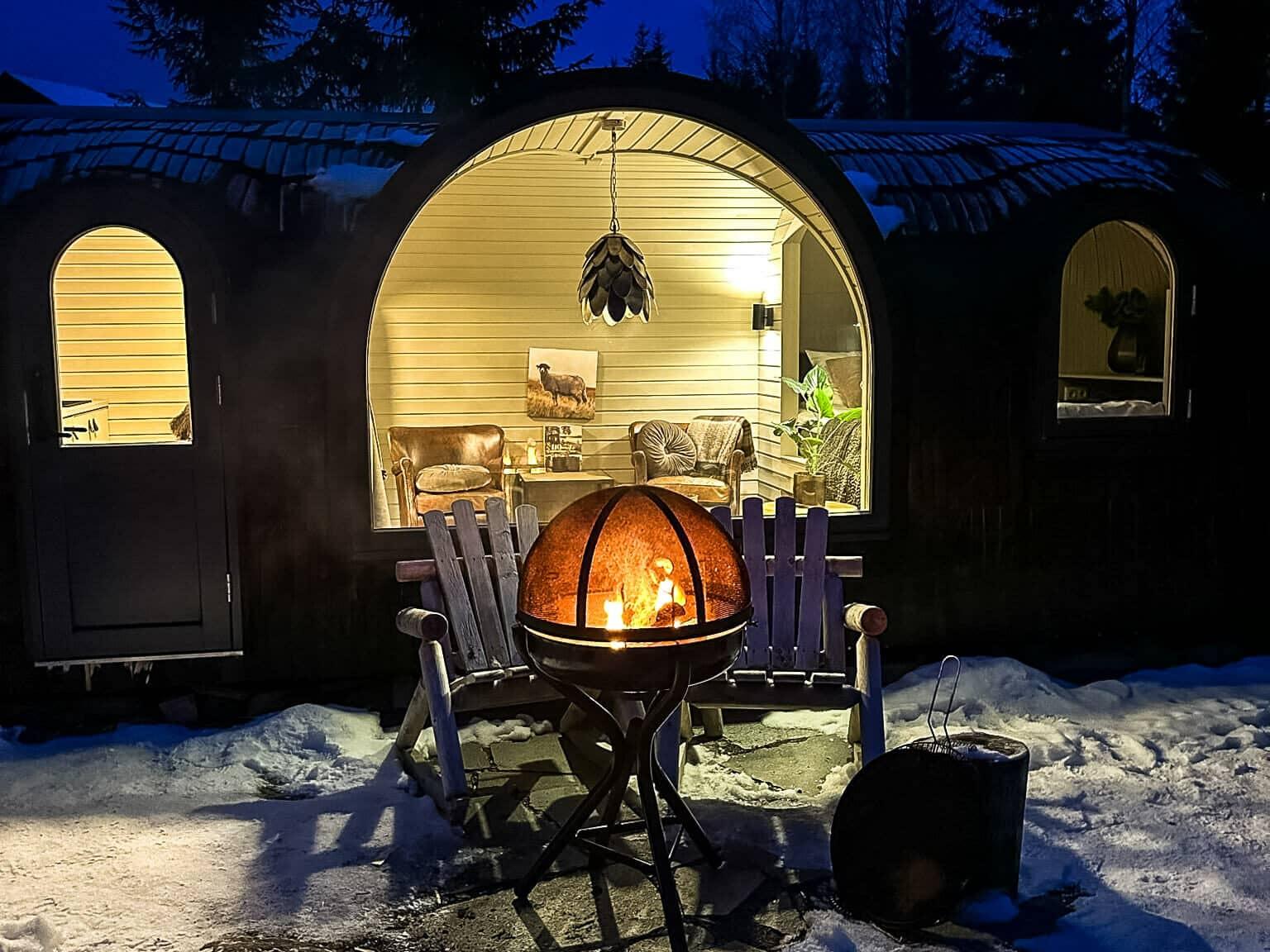 A campfire in front of the Kongley cabin at Villa Heidi.