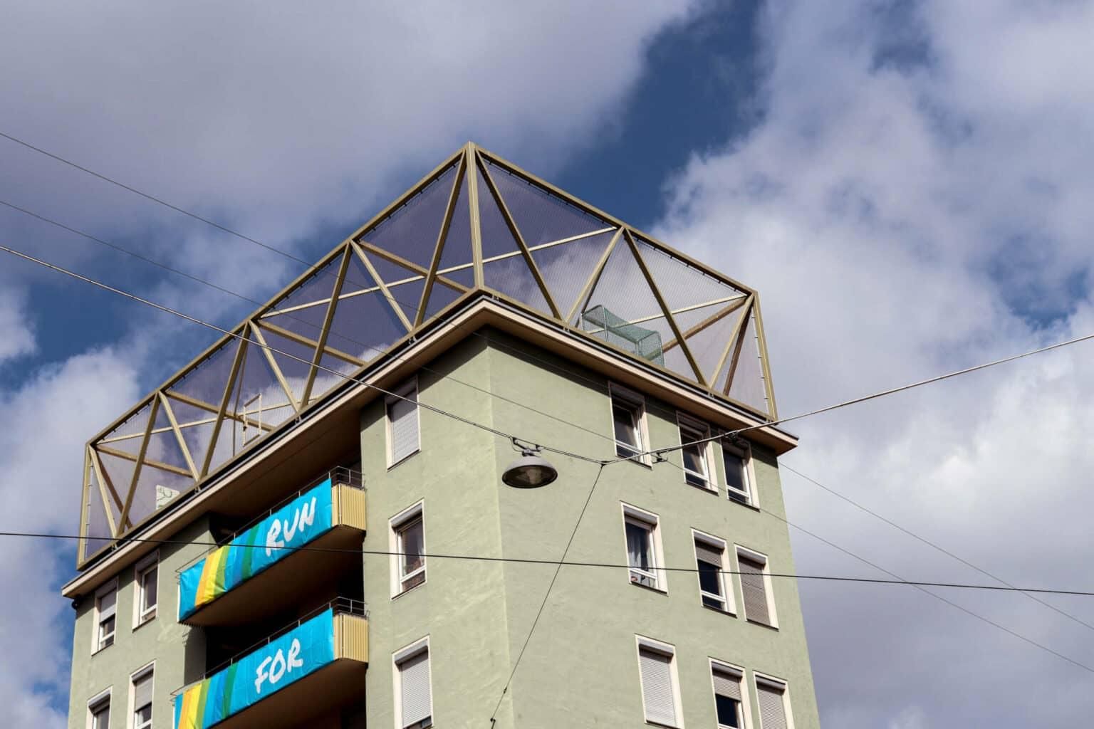 A sports field with goals on a rooftop, the Dachsportplatz in Munich.
