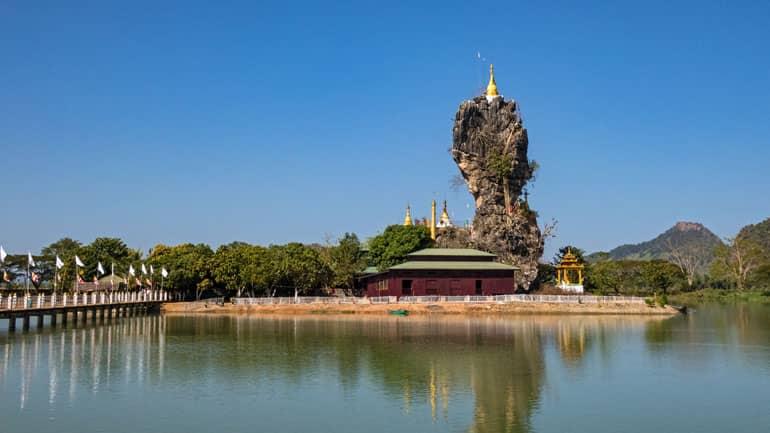 In Hpa An, Myanmar, a house on a small island with a huge stone bears the name Kyauk Kalat Pagoda.