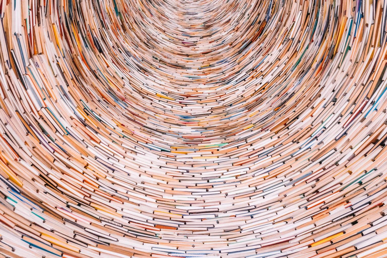 A tower of books in the city library of Prague.