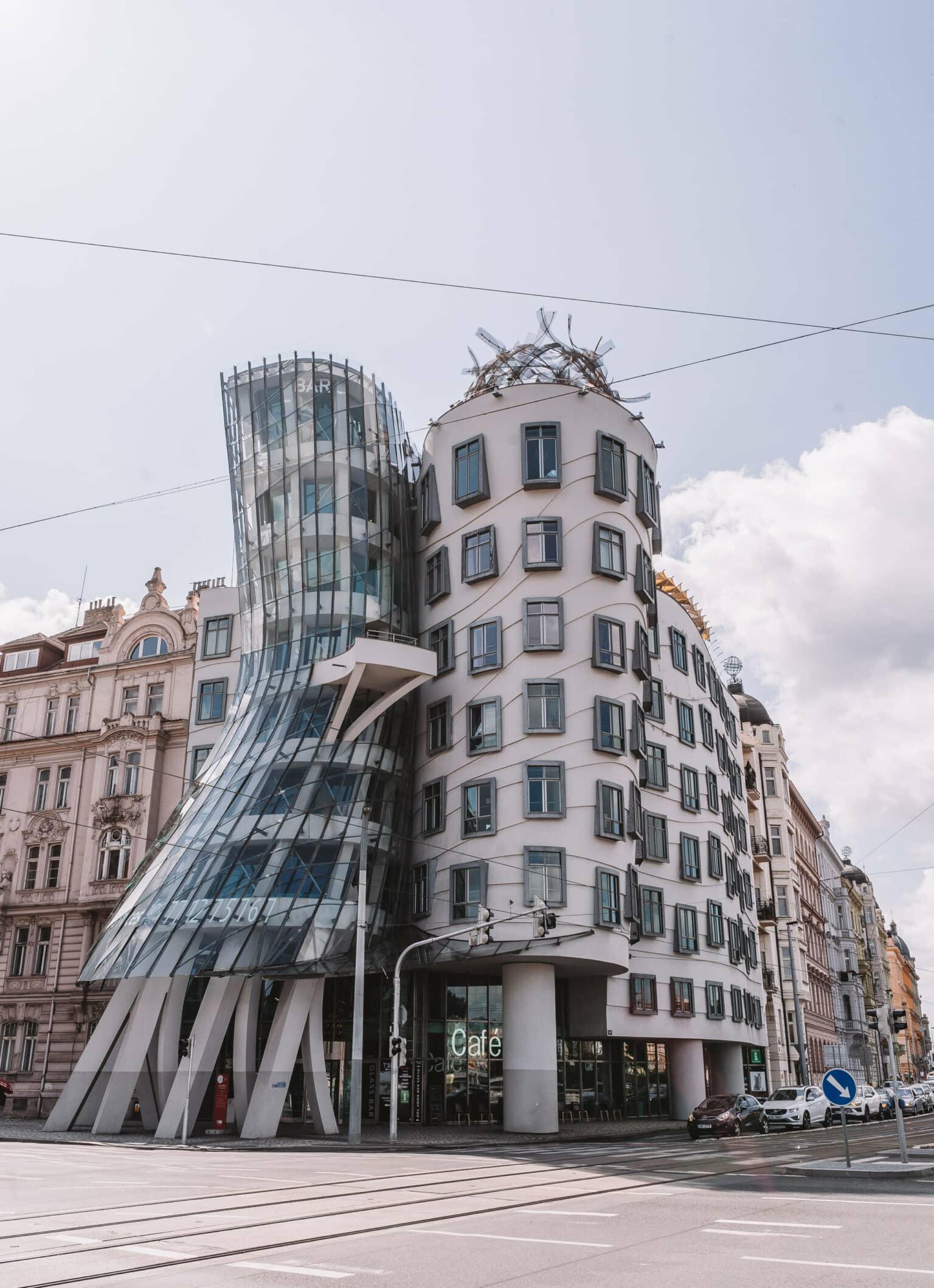 The Dancing House in Prague is a crooked house with many windows.