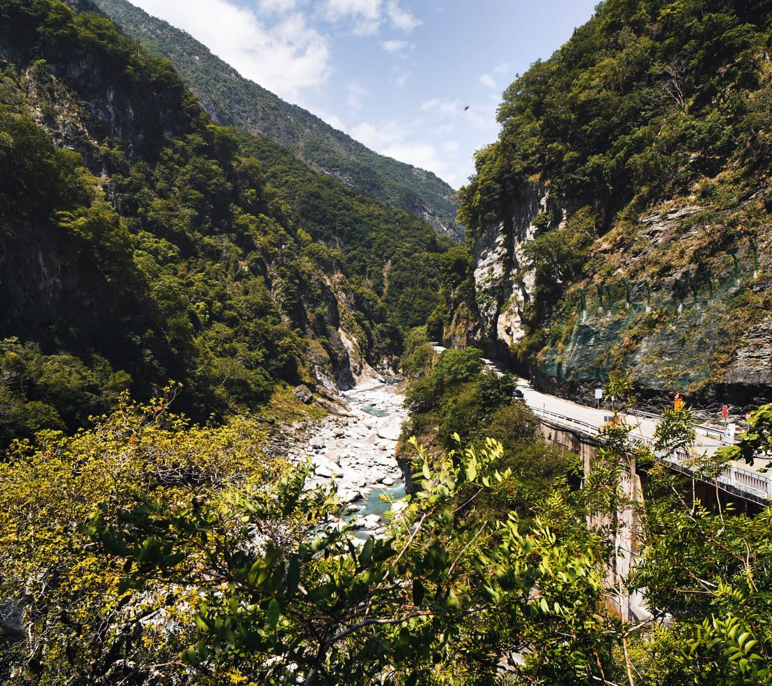 Green rock walls and a river in Taroko National Park in Taiwan.