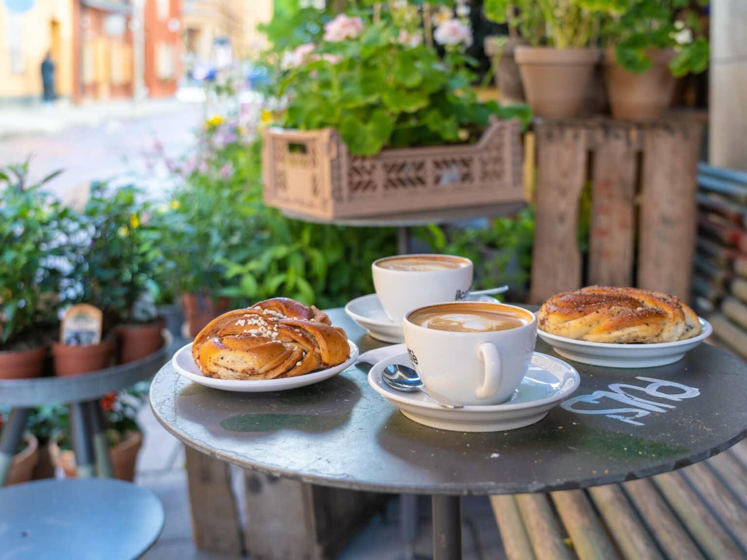 The inviting table set with coffee and Kanelbullar, a Swedish specialty, at 'Il Caffe' looks delightful.