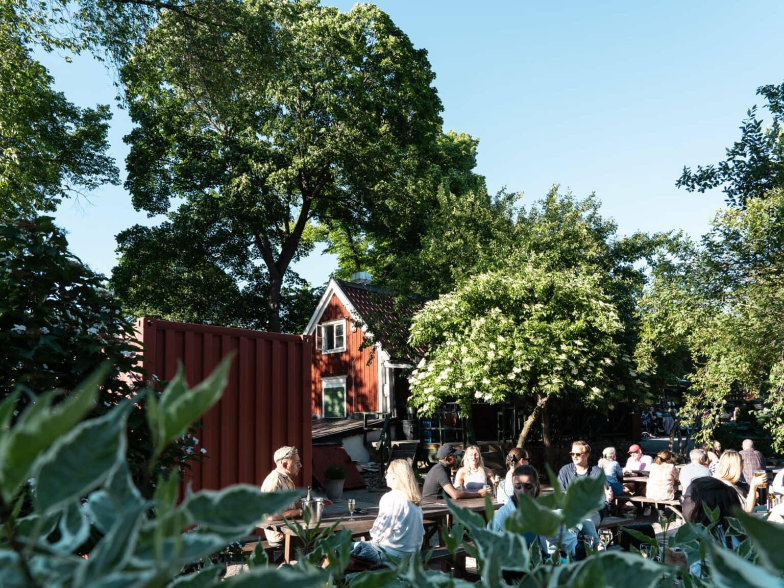 The garden of Lasse i Parken invites you for Swedish food.
