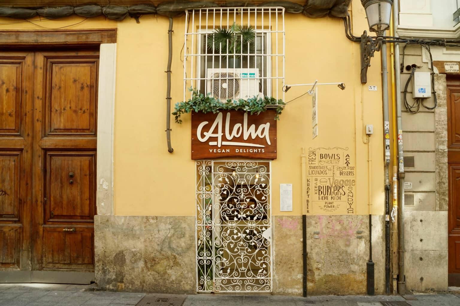 The vegan café Aloha Vegan Delights in Valencia is a hidden gem behind an ornate door.