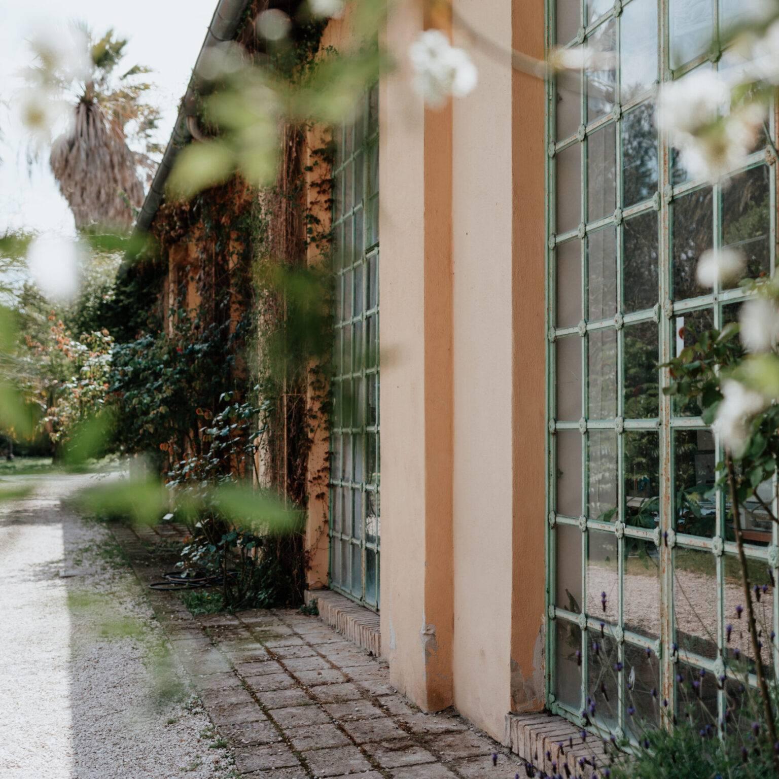 A greenhouse from the outside at the Botanical Garden in Trastevere.
