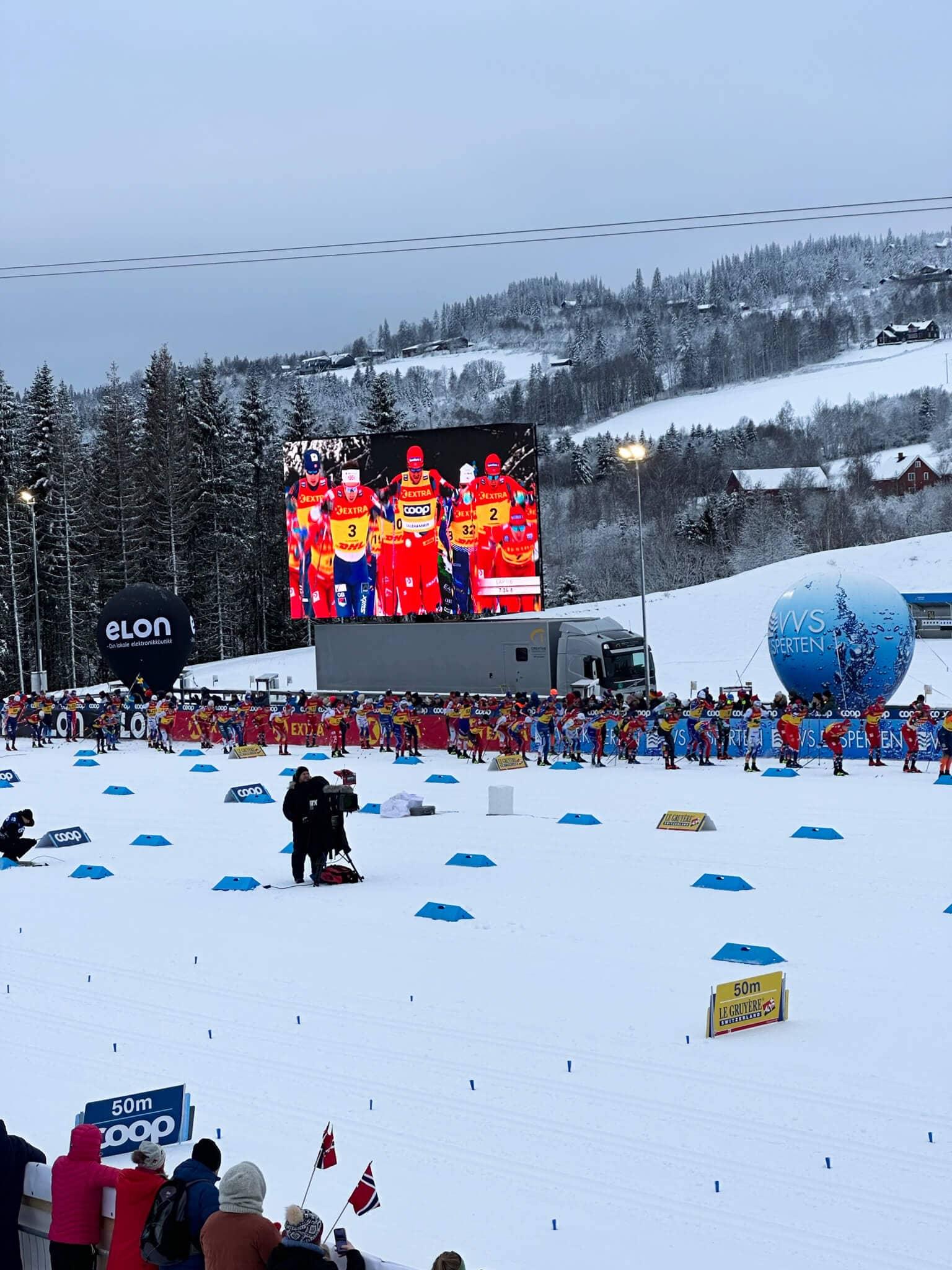 The cross-country skiing World Cup in Lillehammer with a large screen in the background.