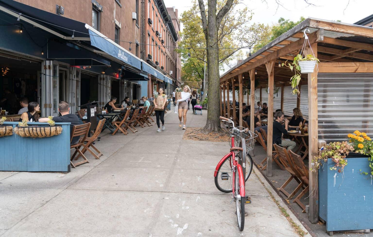 The walkway leads directly through the seating area of the Abline Bar in Cobble Hill, Brooklyn.