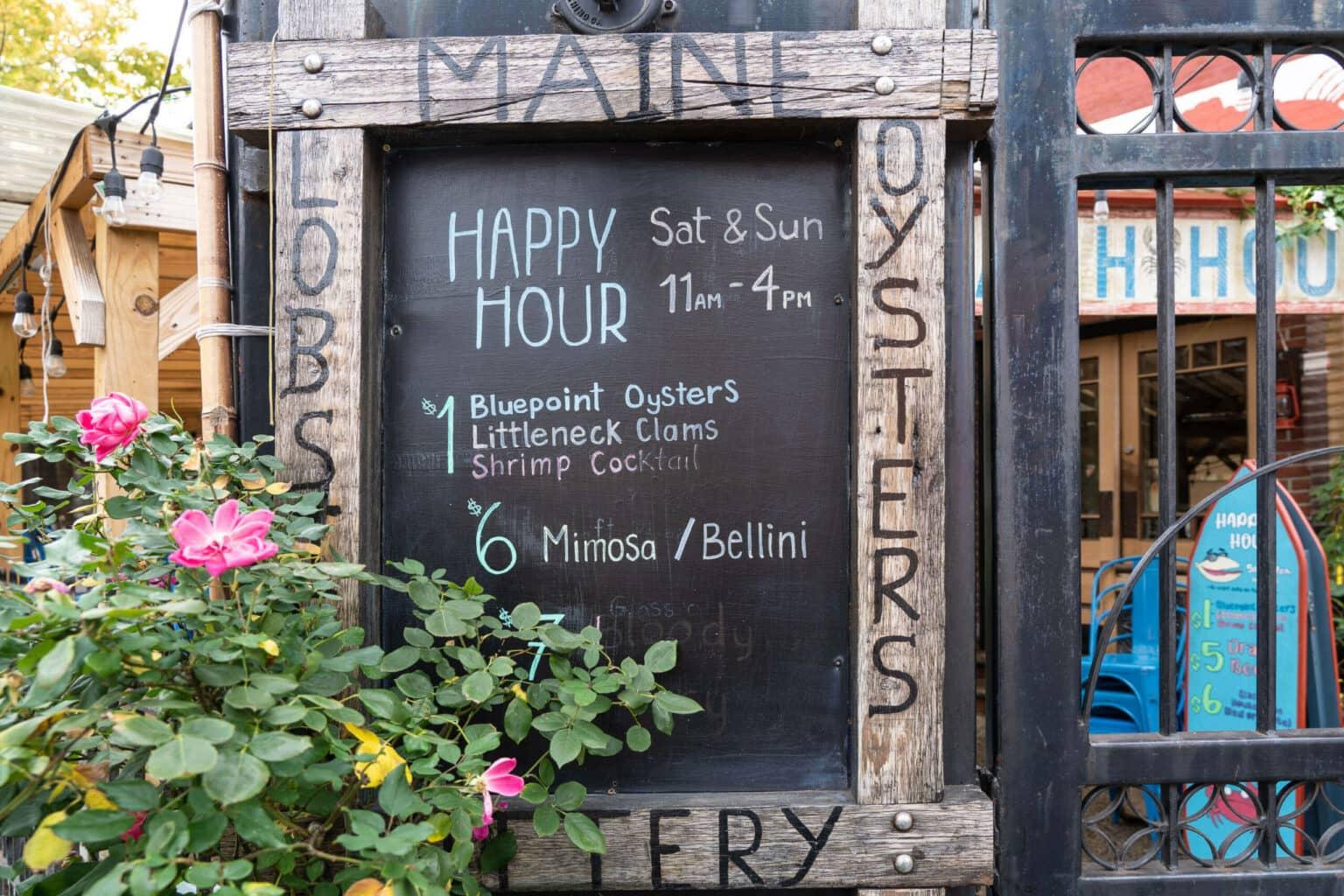 The happy hour menu of Carroll Gardens' Kittery in New York on a chalkboard.