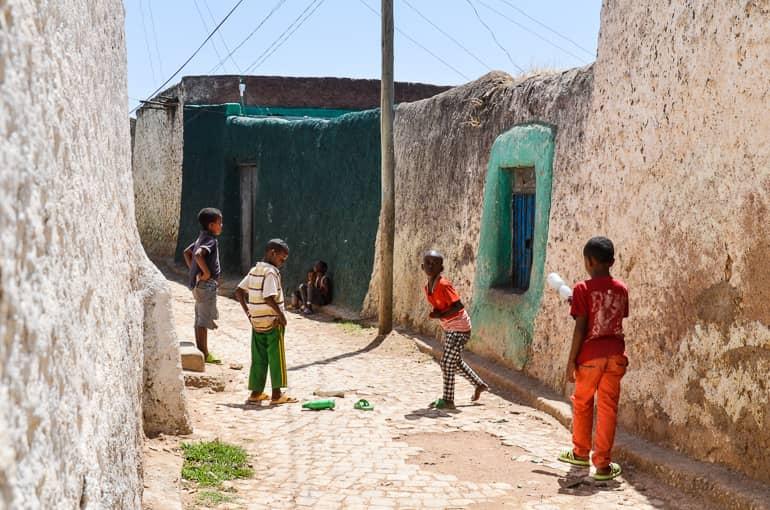 Local children joyfully play in the streets of Harar, Ethiopia. A trip to the cradle of humankind is worthwhile!