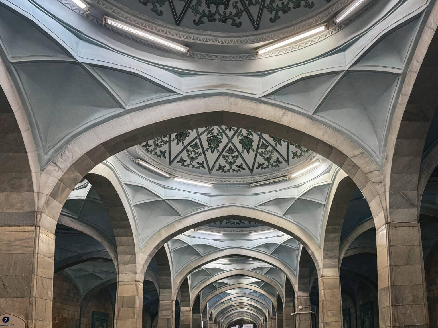 Vaulted ceiling with intricate decorations in the Alisher Navoi Metro Station in Tashkent