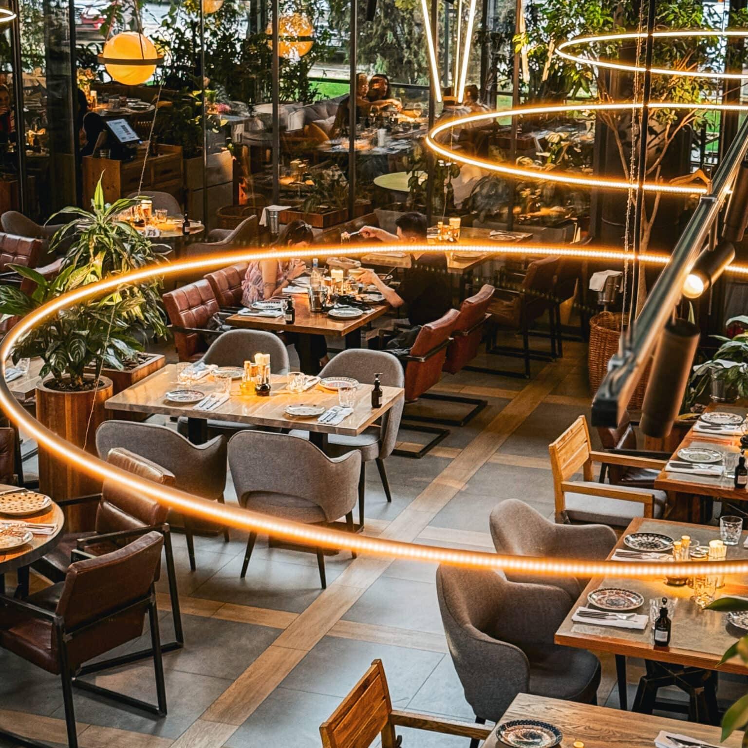 Modern restaurant Syrovarnya in Tashkent with stylishly set tables