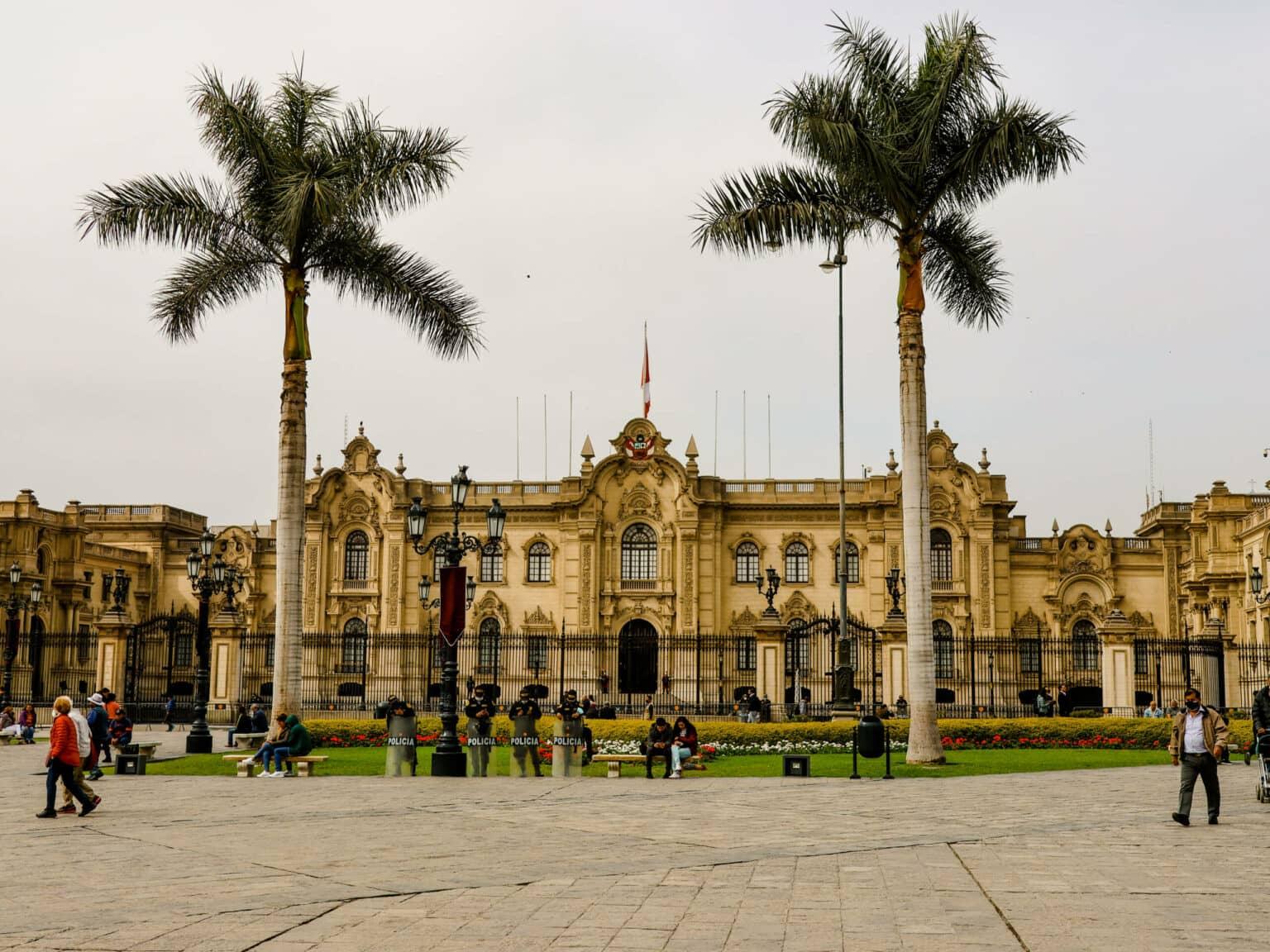 The pompous yellow government building at Plaza de Armas.