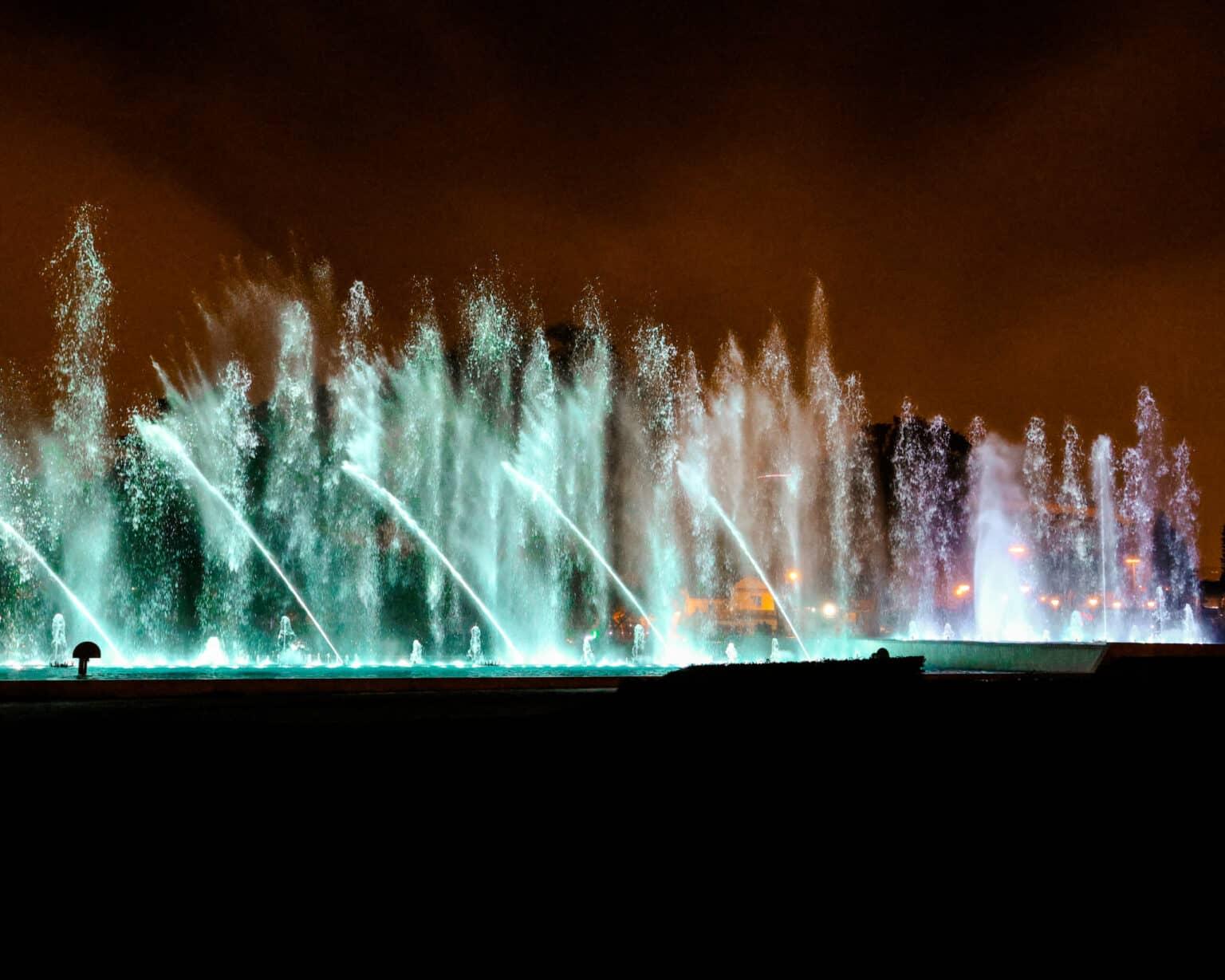 The water show at the Magic Water Circuit in Lima at night.