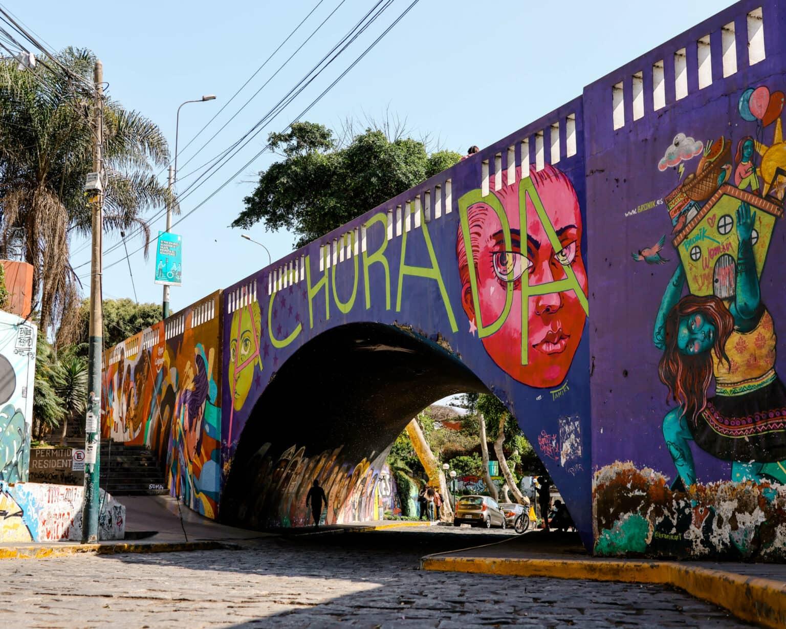 The San Martin Bridge in Barranco district of Lima is covered in colorful graffiti.