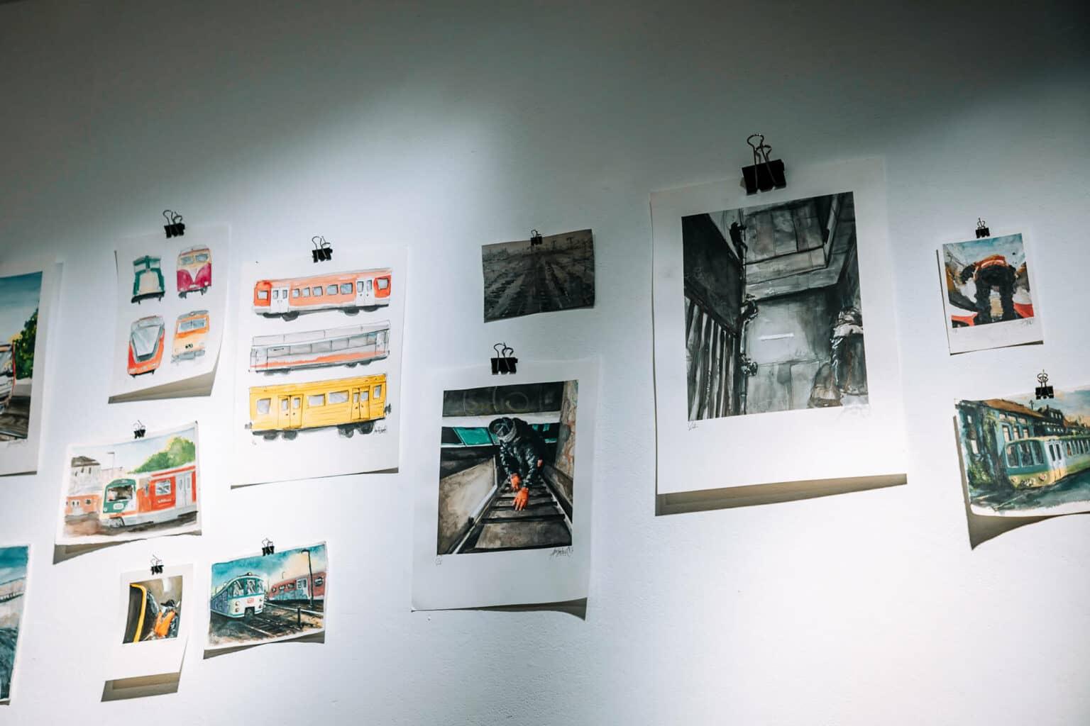Various artworks on sheets of paper on the wall in the K-OZ Gallery in Hamburg.