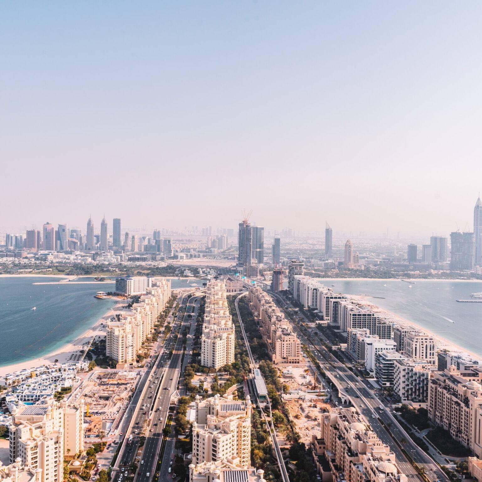 Dubai and its marina from a bird's eye view from the AURA Skypool.