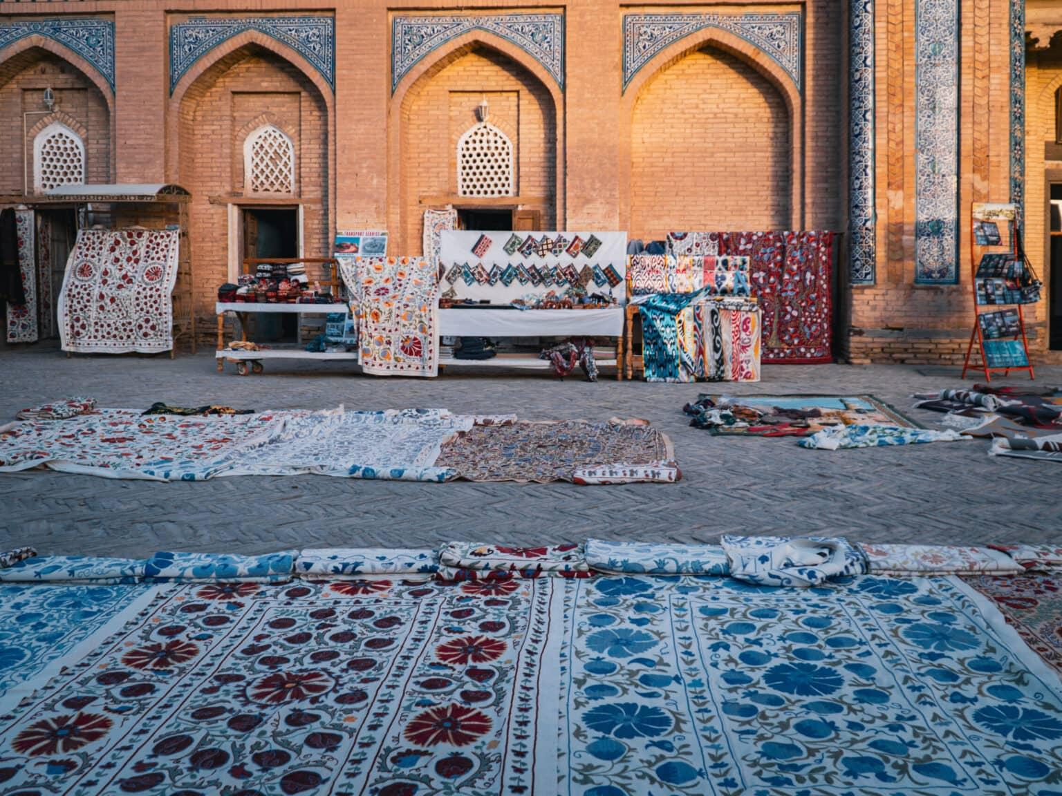 The bazaar in Khiva with colorful carpets