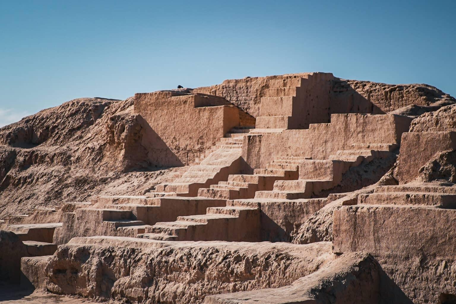 Ruins of the ancient fortress Toprak-Kala with terraced steps in the desert of Uzbekistan