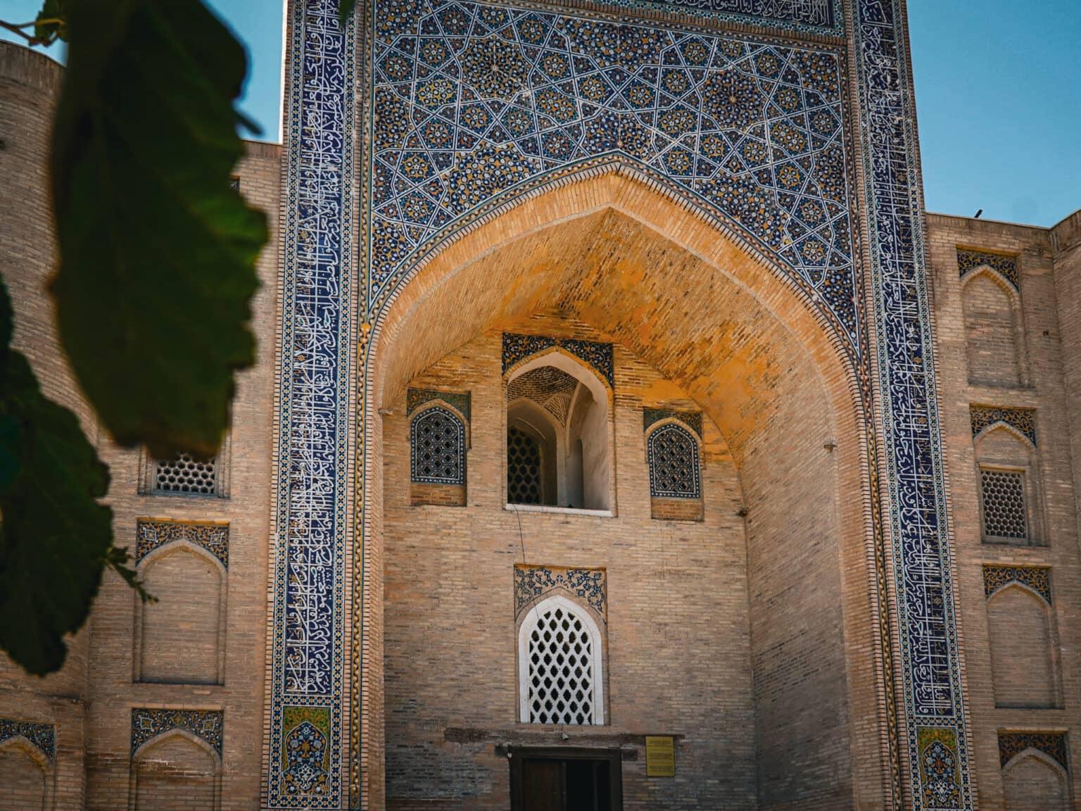 The exterior facade of the Nadir Devon Begi madrasa with intricate ornaments