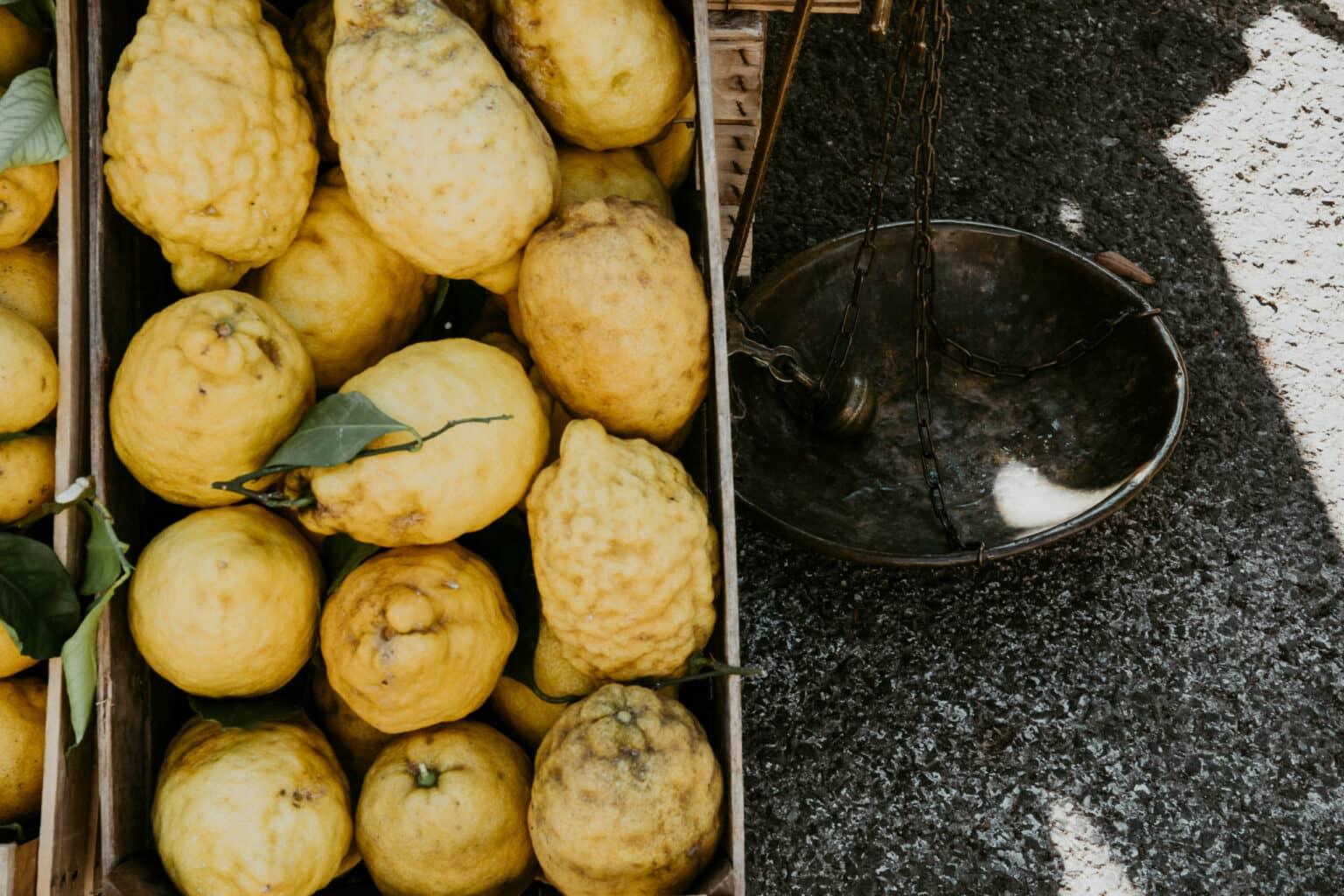 Lemons lying in a basket.