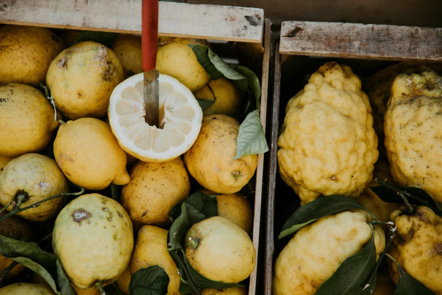 Lemons lying in a basket.