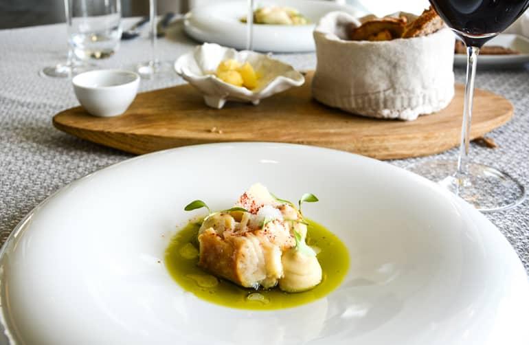 A plate with food arranged on it.