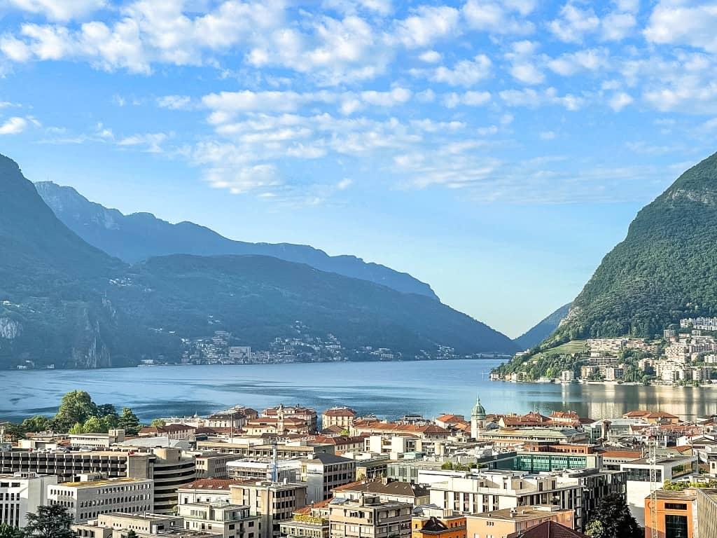 The breathtaking view over Lugano and Lake Lugano extending to the mountains in the background.