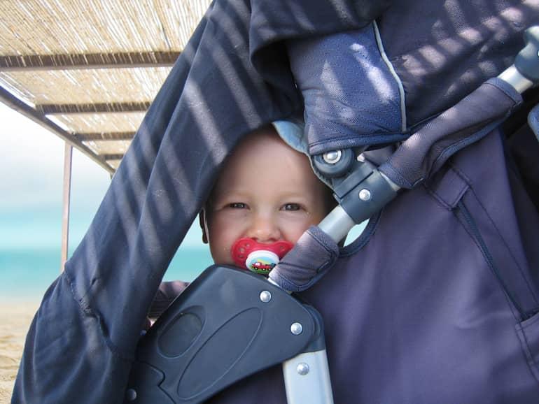 Parental Leave Trip: Child in a stroller by the sea