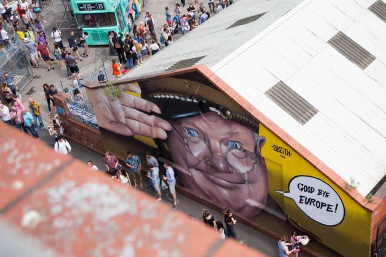 At Upfest in Bristol, England, a British soldier is painted on a building facade, saluting with the speech bubble saying: 'Goodbye Europe.'