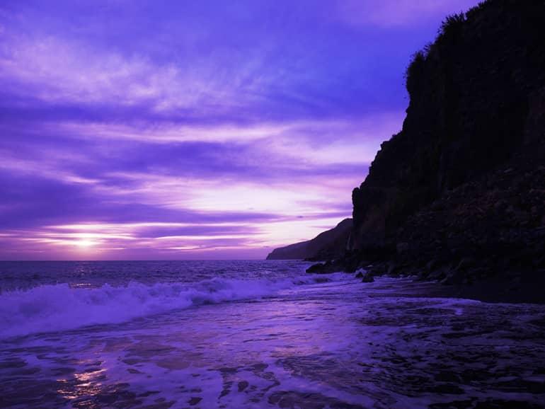 Madeira surfing: A beach during sunset.
